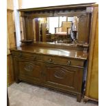 A 6' early 20th Century polished oak mirror back sideboard with flanking part fluted columns and