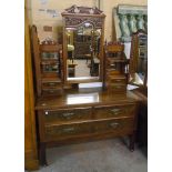 A 4' Edwardian walnut dressing table with triple swing mirrors, flanking mirror backed shelves and