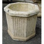 An octagonal garden planter with fluted decoration