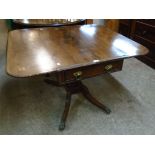 A 3' 6" late Regency mahogany and brass inlaid Pembroke table with single drawer and opposing