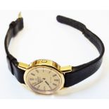A lady's gold tone cased Omega DeVille quartz wristwatch on black leather strap - no box, no papers