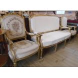 A French style giltwood show frame three piece suite, comprising 5' 5" settee upholstered in