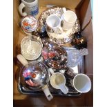 A box containing various ceramic items including tea set with insulated teapot, glass bell, etc.