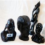 An African carved hardwood head, signed Oziegbe - sold with two other carved wood heads and a