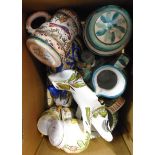 A box containing a collection of Portuguese pottery items including jugs, etc.