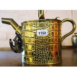 A Victorian brass hot water can with reptile skin design, bearing J. Sankey Poseidon mark - sold