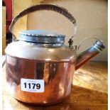 A late Victorian Drew & Sons copper picnic kettle with screw thread to lid and spout and wicker