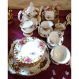 A Royal Albert Old Country Roses pattern twelve place tea set including teapot, two jugs, sugar