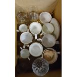 A box containing a quantity of modern commemorative mugs and glasses including Dartington