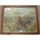 A pair of oak framed oileographs, depicting Boer War battle scenes