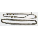 A silver reeded bauble bead necklace - sold with a white metal guard chain