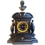 A 25" late Victorian ornate black slate cased mantel clock celebrating the works of William