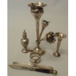 A silver pepperette - Birmingham 1907 - sold with a silver epergne (a/f), napkin ring and bud