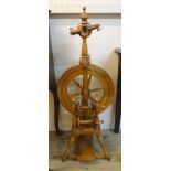 A 20th Century stained wood spinning wheel