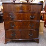 A 36" mahogany and cross banded bow front chest with decorative blind drawer and three long