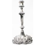 A 10¼" cast silver candlestick with decorative twist stem and acanthus scrolls to shaped base -
