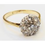 An 18ct. gold diamond cluster ring