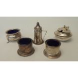 A pair of silver salts with blue glass liners, another salt, mustard pot and pounce pot - Birmingham