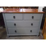 A 3' 6" painted and varnished wood chest of two short and two long graduated drawers, set on