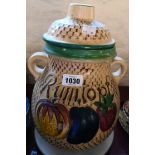 A West German stoneware lidded rum punch jar with text, "Rumtopf " and fruit decoration - sold