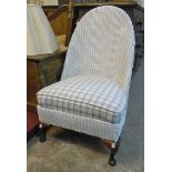 A Lloyd Loom hoop back boudoir chair with sprung seat and later white painted finish