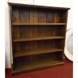 A 3' 2" stained hardwood four shelf open bookcase, set on plinth base