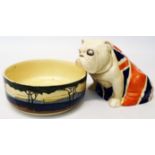 A 1940's Royal Doulton bulldog draped in a Union flag - sold with a Royal Doulton bowl in the