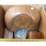 A box containing assorted clocks and timepieces including Elliott timepiece, Arts and Crafts