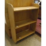 A 20" old waxed pine wall hanging three shelf open bookcase