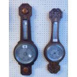 Two 20th Century carved oak framed banjo barometer/thermometers, both with aneroid works