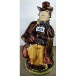 A 19th Century majolica lidded Toby jug with caryatid handle - a/f