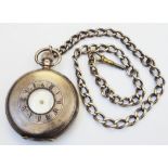 A silver cased half hunter pocket watch - Birmingham 1937 (a/f) on silver curb link watch chain with