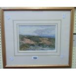 A gilt framed watercolour, depicting a moorland view - indistinctly signed