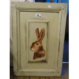 A medium painted panel with central rabbit decoration