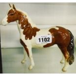 A Beswick skewbald pony 1373