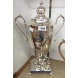 An 18" late Victorian silver plated tea urn with incised decoration, acanthus loop handles and tap