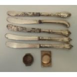 Five silver handled butter knives - sold with two silver watch cases