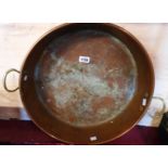 A 20th Century copper preserve pan with brass handles