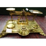 A late Victorian set of brass postal scales and weights