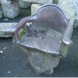 A late 19th Century American Folk Art salt glazed sewer pipe garden elbow seat in the form of a