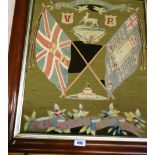 A late Victorian military woolwork picture depicting the colours and badge of the Royal Warwickshire