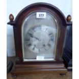 A stained walnut cased dome top table clock with W.B.K. & Fils, Paris eight day gong striking