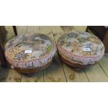 A pair of Edwardian walnut framed footstools with tapestry and fringed tops