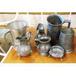 A collection of pewter items including a Swatow Wah Lee glass bottomed tankard with engraved