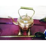 A copper kettle, two funnels, and a brass novelty sword pattern fire poker