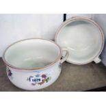 Two matching chamber pots with floral decoration