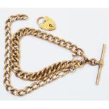 A 9ct. rose gold part double Albert watch chain and 9ct. heart shaped padlock