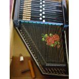 A boxed autoharp