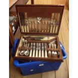 A crate containing a quantity of silver plated cutlery including canteen, cased fish knives and