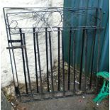 A pair of wrought iron gates to fit 6' 8"